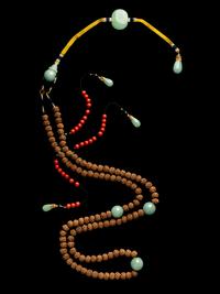 A Chinese Carved Seed Court Necklace, Chaozhu
