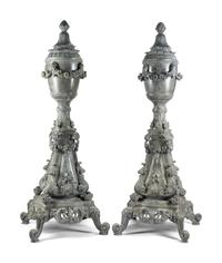 A Pair of Monumental Italian Carved and Faux Marble Painted Urns on Stands