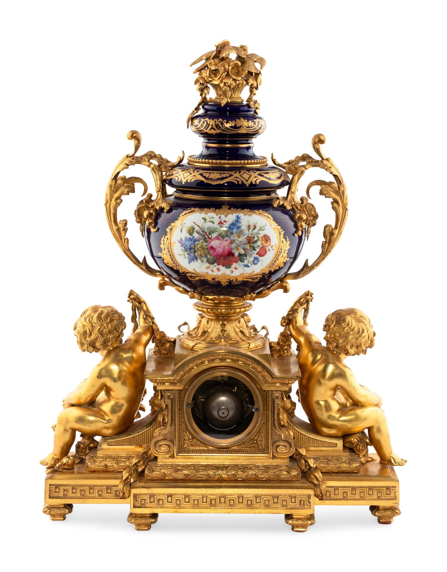 A French Gilt Bronze and Sèvres Style Porcelain Clock