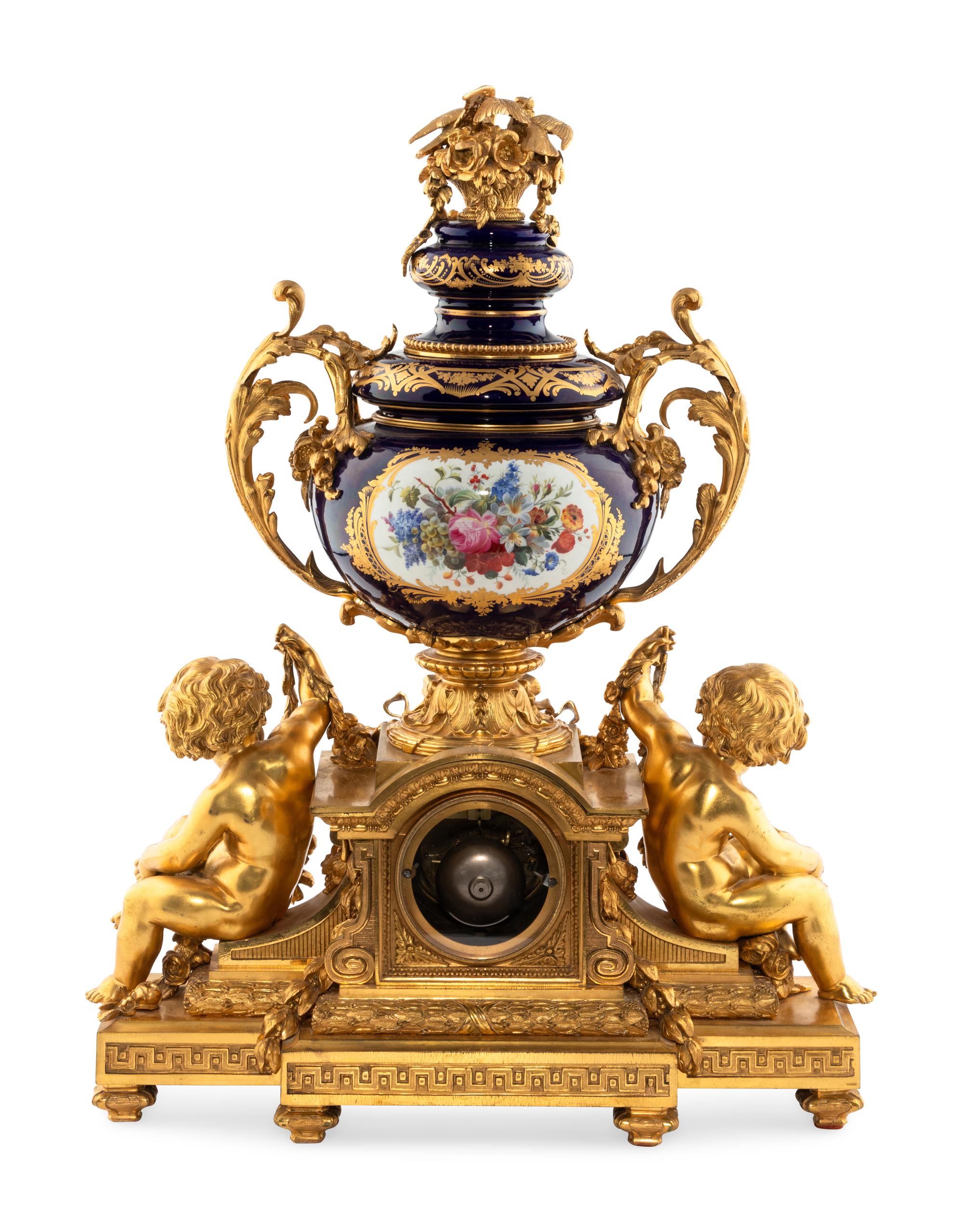 A French Gilt Bronze and Sèvres Style Porcelain Clock