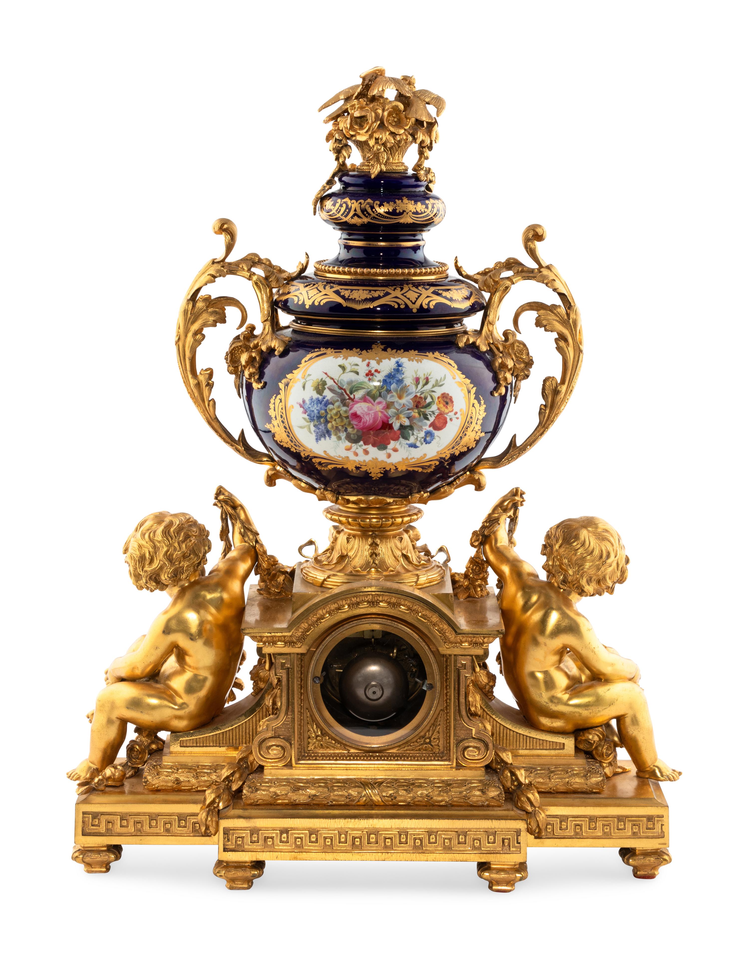 A French Gilt Bronze and Sèvres Style Porcelain Clock