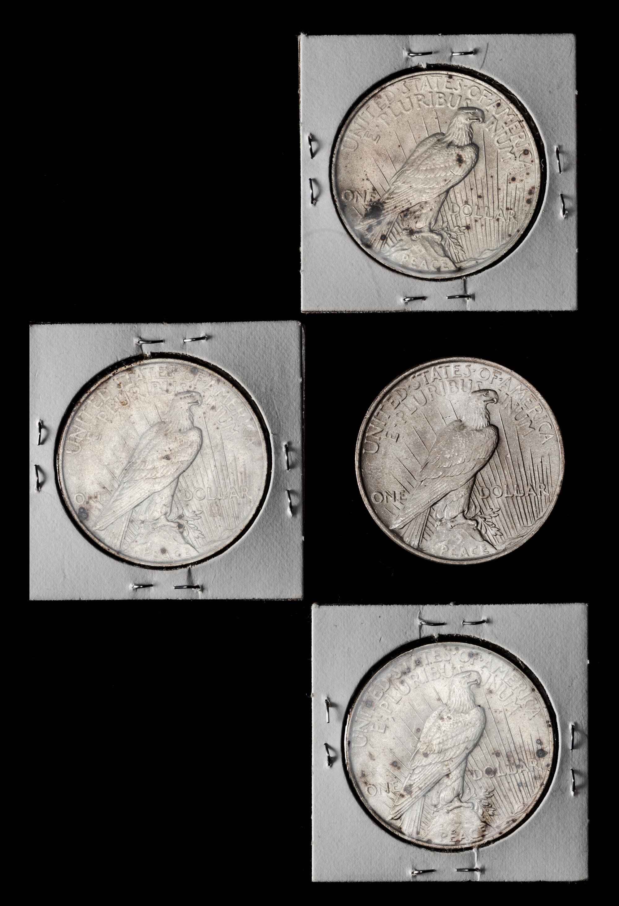 A Group of Four United States 1923 Peace Dollar Coins