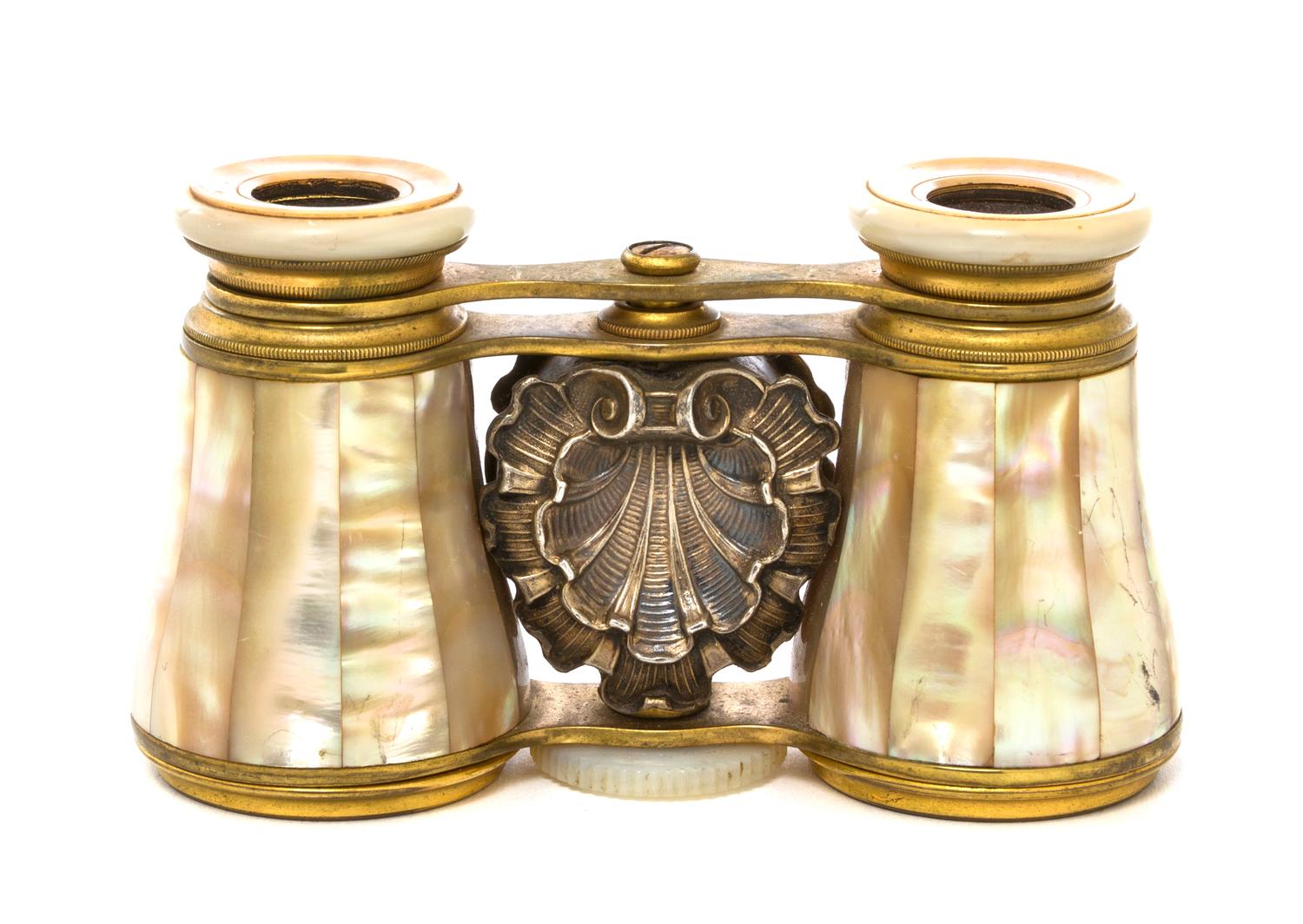 A Pair of Mother-of-Pearl Veneered and Silver Set Opera Glasses, Width 3 7/8 inches.