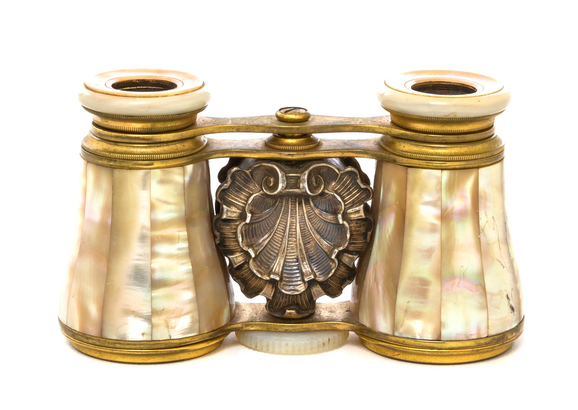 A Pair of Mother-of-Pearl Veneered and Silver Set Opera Glasses, Width 3 7/8 inches.