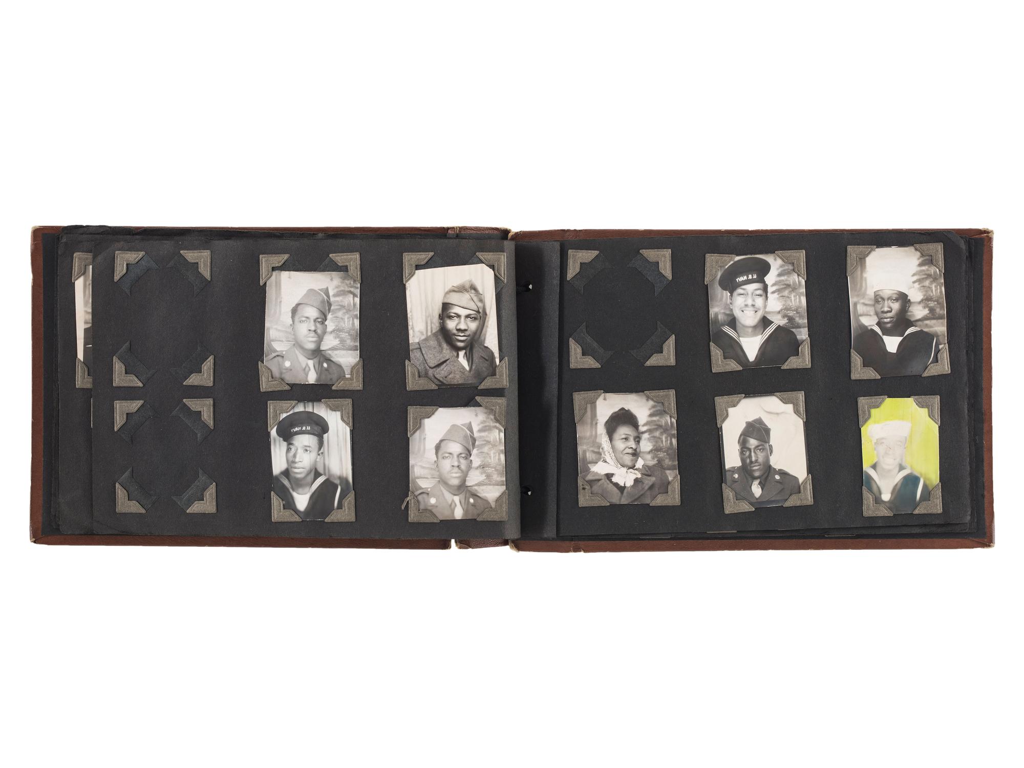 [WORLD WAR II]. A collection of over 100 snapshots of African American soldiers, sweethearts, and family. Ca 1940s-1950s.