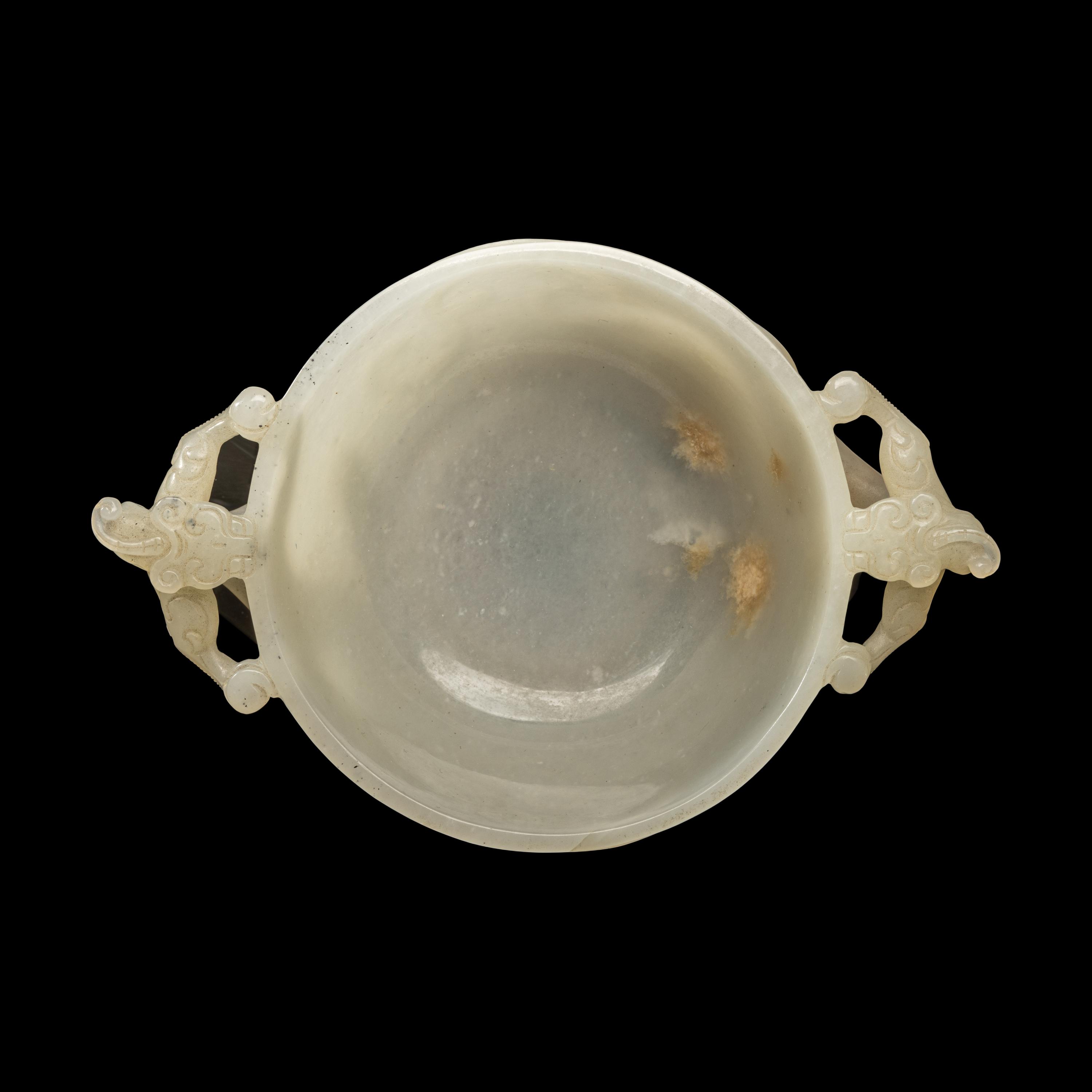 A Chinese Carved White Jade 'Chilong' Handled Cup, 19th/Early 20th Century 晚清/民國 白玉螭龍雙耳杯