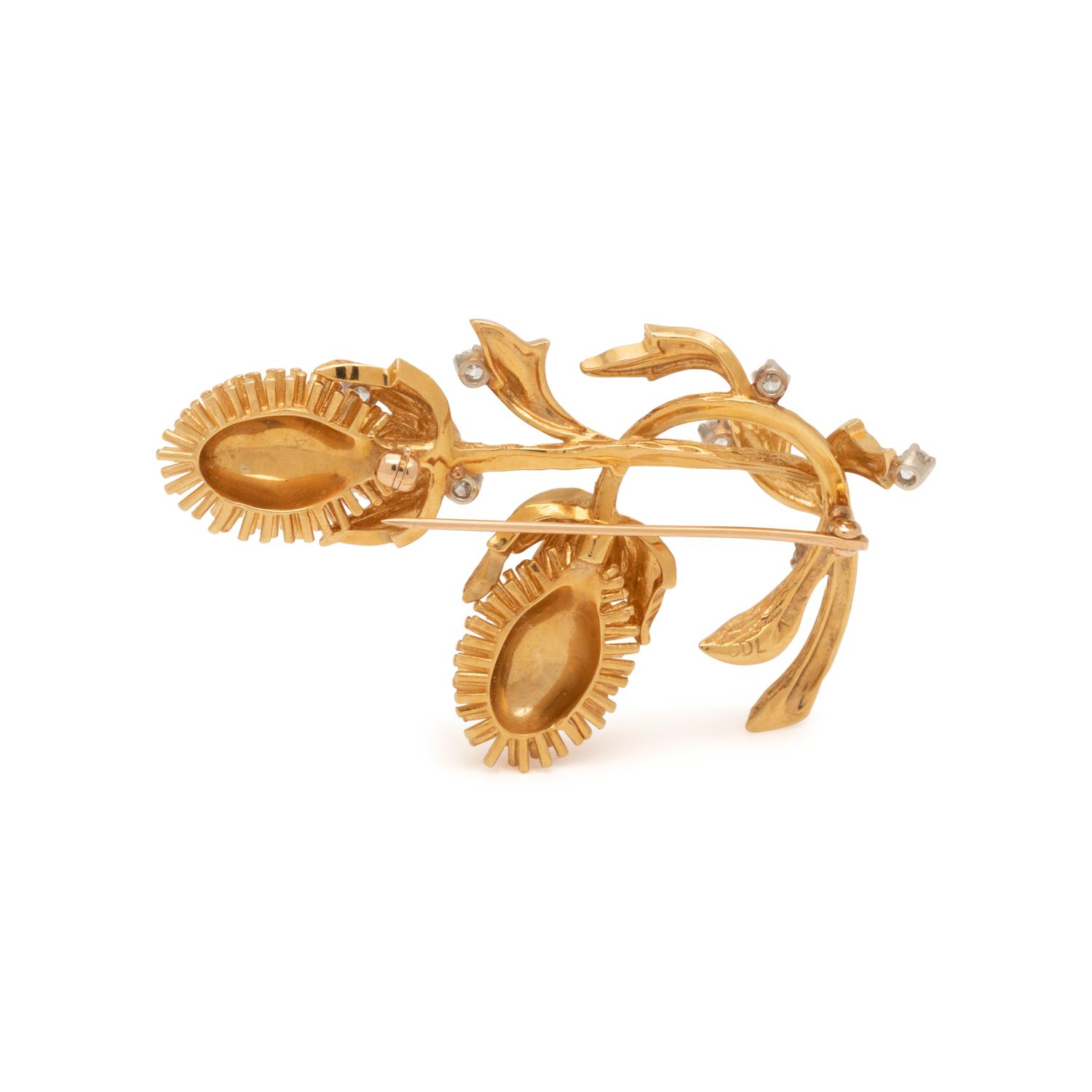 CARL D. LINDSTROM, YELLOW GOLD AND DIAMOND BROOCH