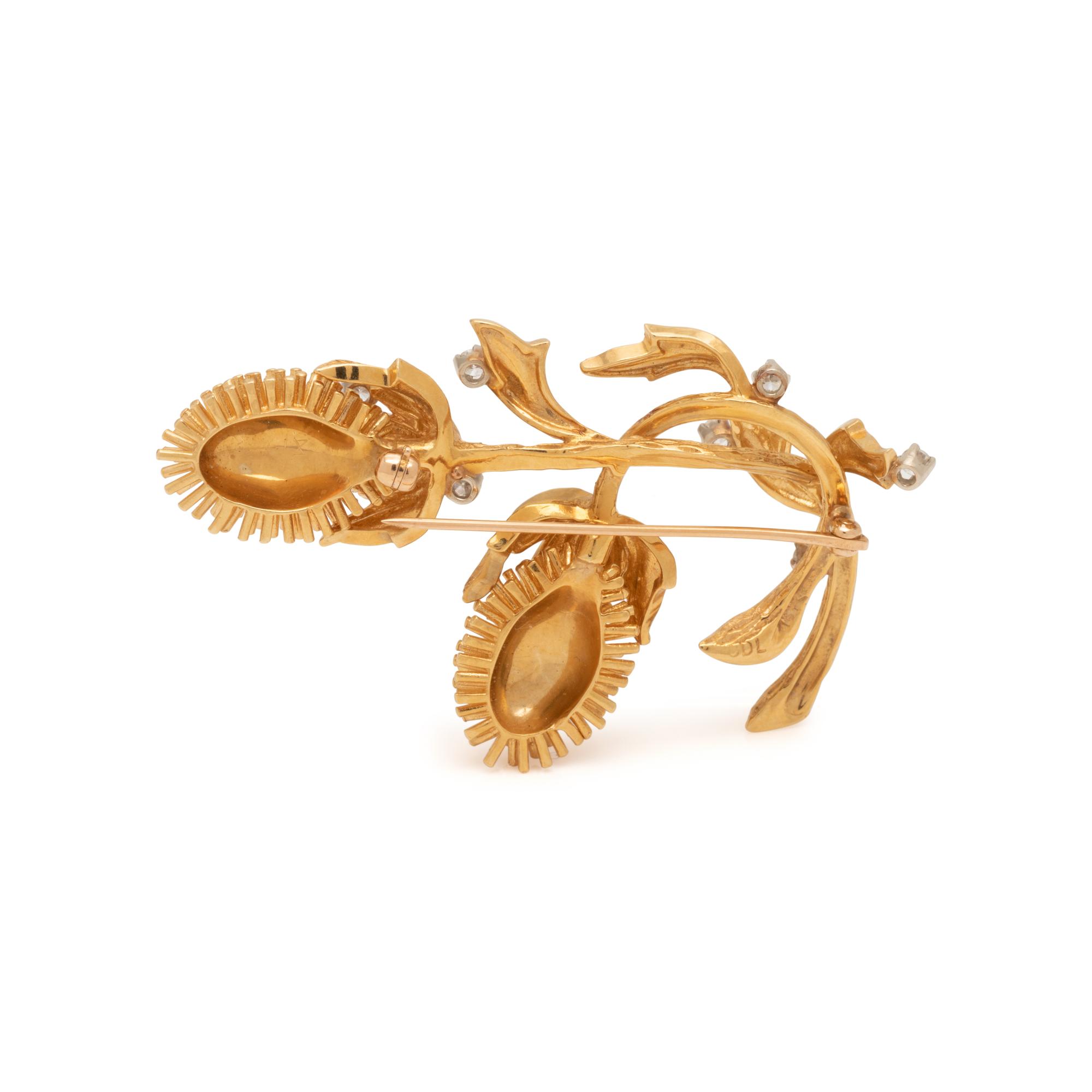 CARL D. LINDSTROM, YELLOW GOLD AND DIAMOND BROOCH