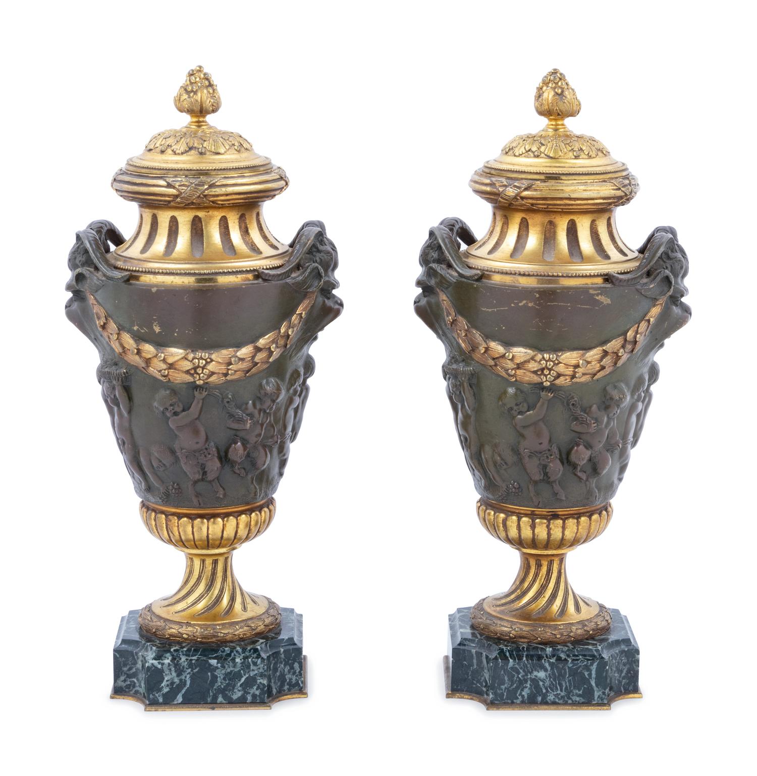 A Pair of Neoclassical Gilt and Patinated Bronze Urns