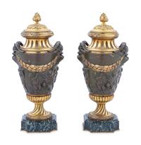 A Pair of Neoclassical Gilt and Patinated Bronze Urns