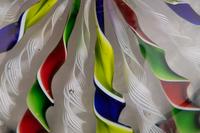 A Four-Color Ribbon and Latticino Twist Crown Glass Paperweight