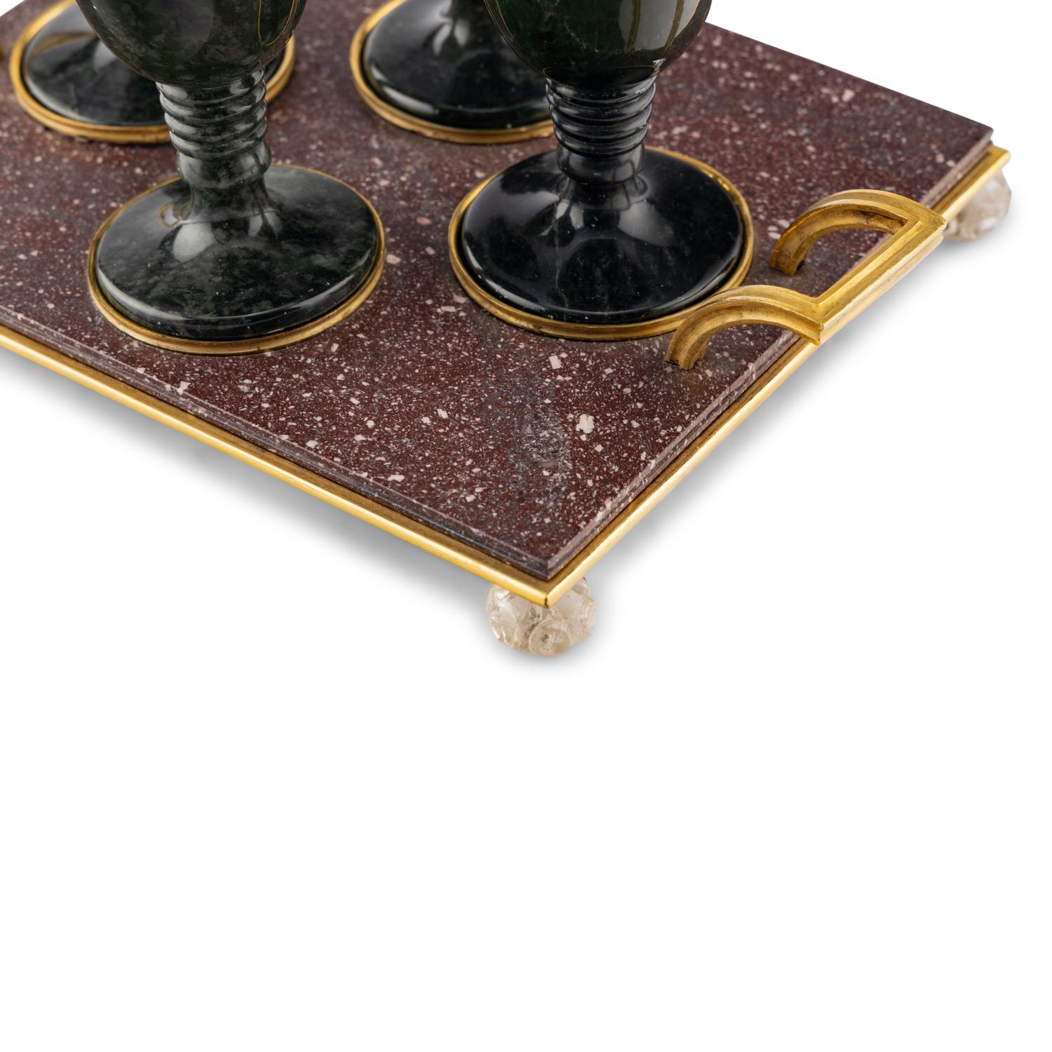 A Gilt Bronze Mounted Porphyry and Spinach Jade Cordial Set