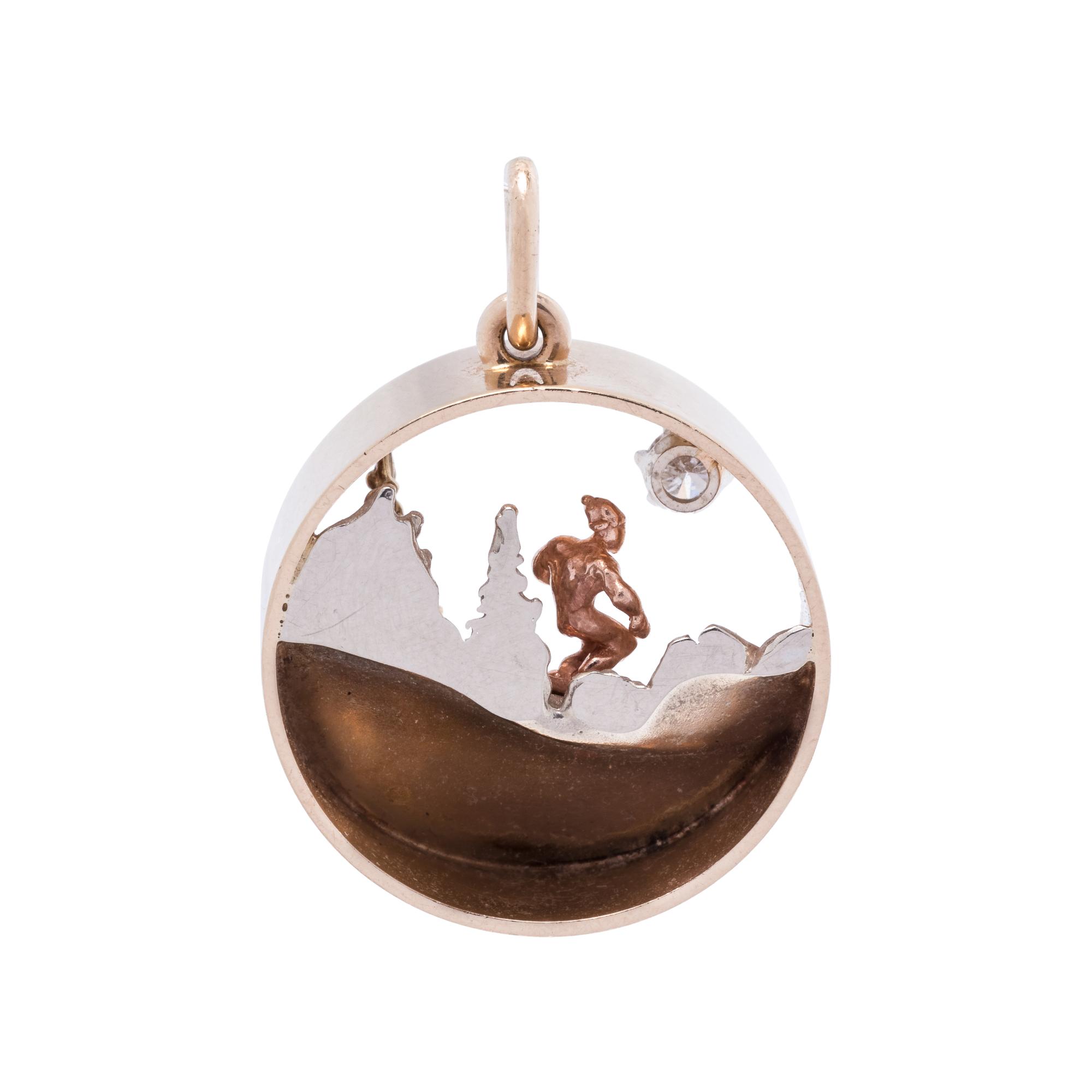 BRYSON, GOLD AND DIAMOND SKIER PENDANT
