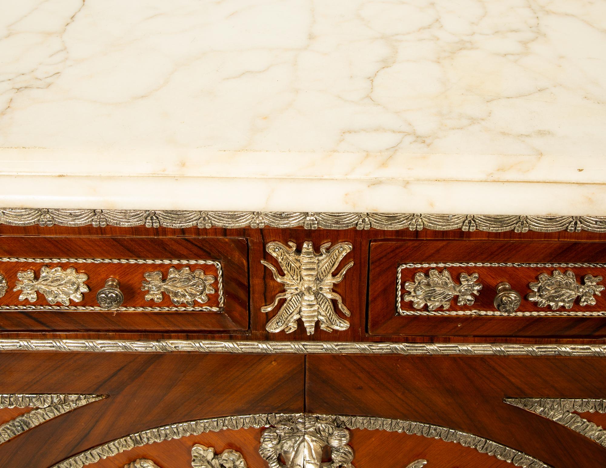A Louis XVI Style Silvered Metal Mounted Marble-Top Commode à Vantaux after the Model by Guillaume Benneman — 20TH CENTURY