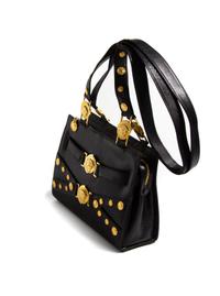 A Gianni Versace Black Leather Shoulder Bag, 11" x 8.25" x 3.5"; Strap drop: 21".
