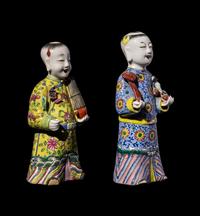 Two Chinese Export Famille Rose Porcelain Figures of Boys