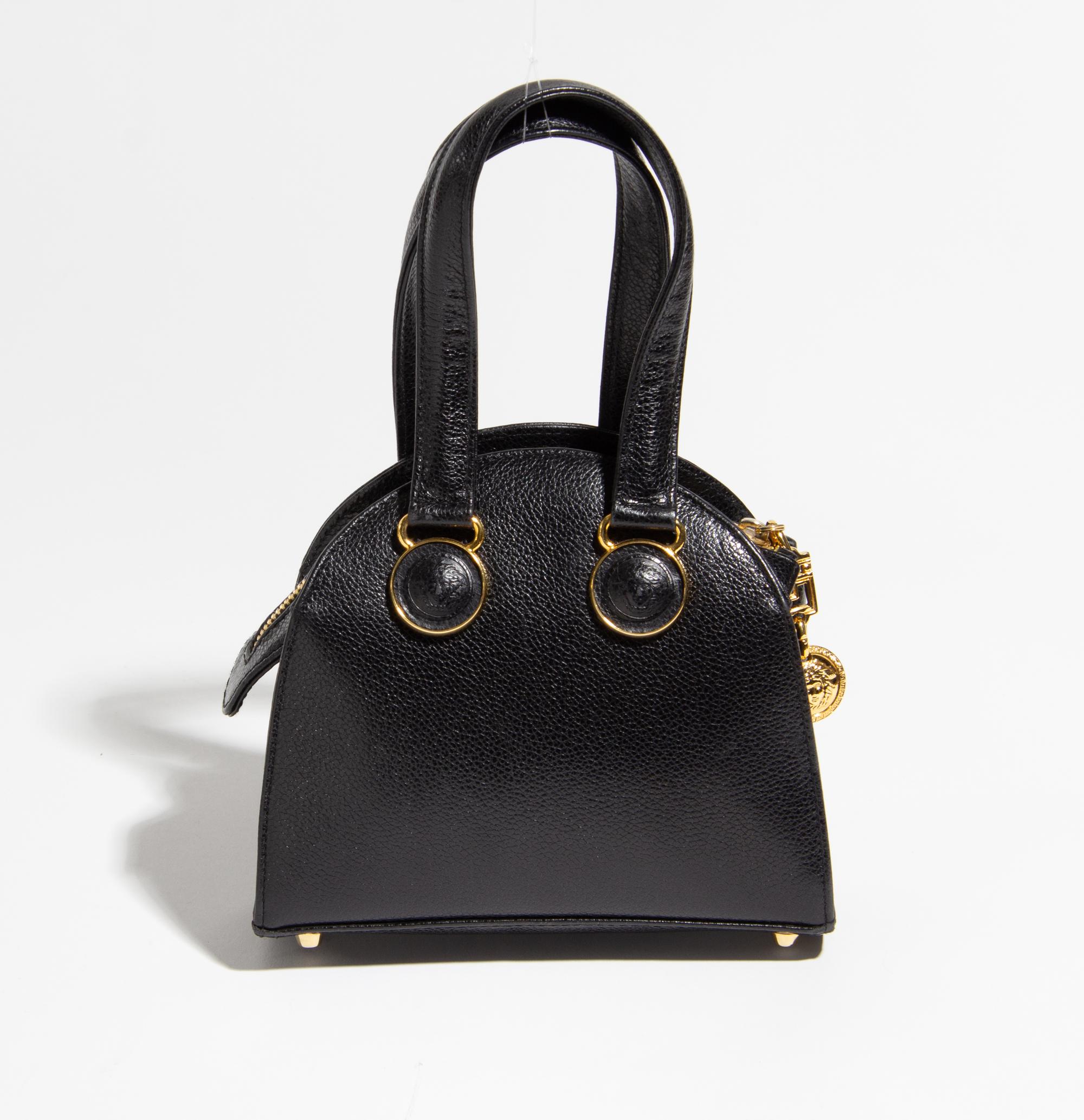 A Gianni Versace Black Leather Mini Medusa Handbag, 6.75" x 6" x 2.5"; Handle drop: 4".