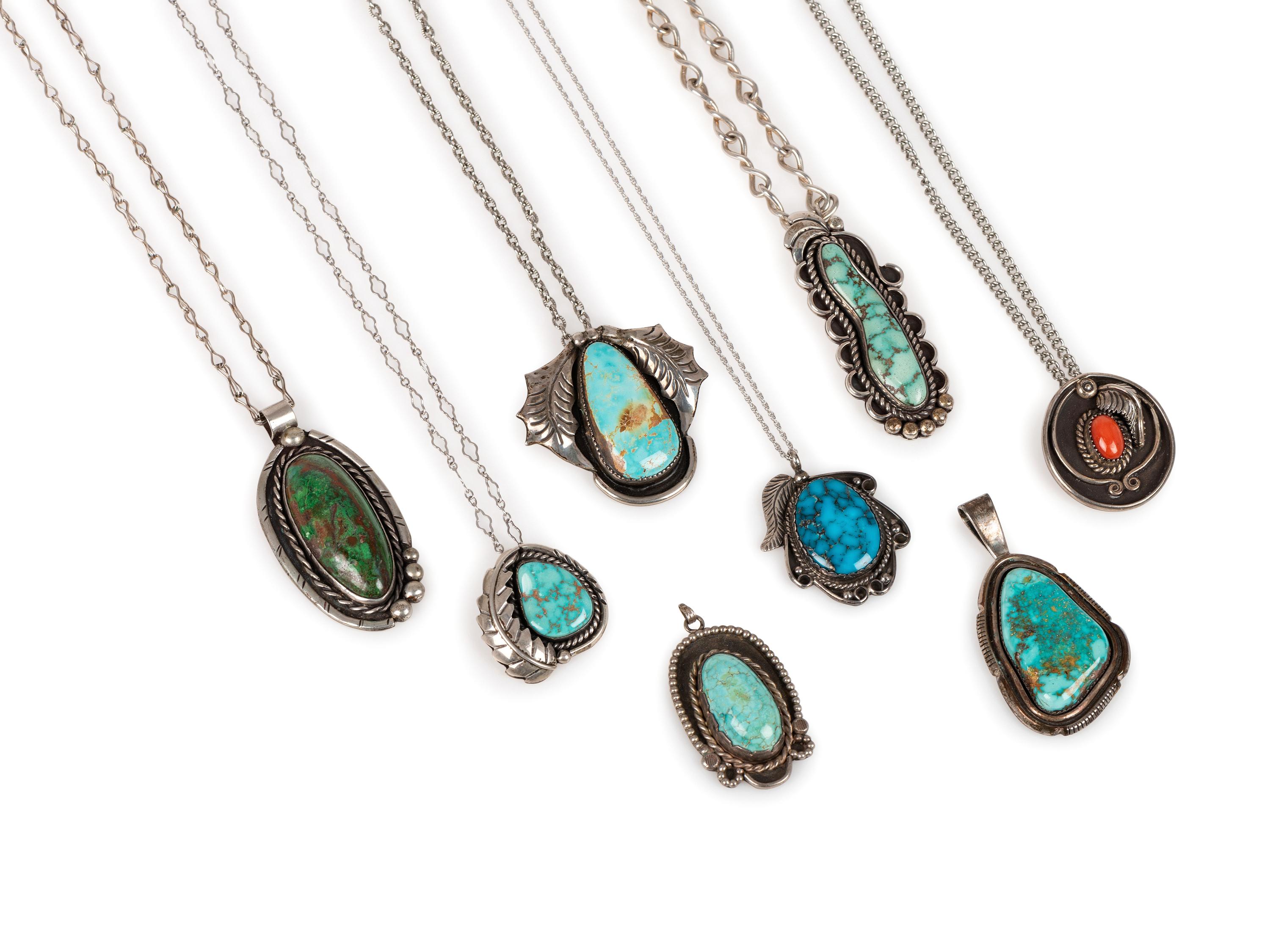 An Assortment Navajo Silver, Coral, and Turquoise Pendants