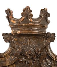 A Continental Carved, Painted and Parcel Gilt Mirror