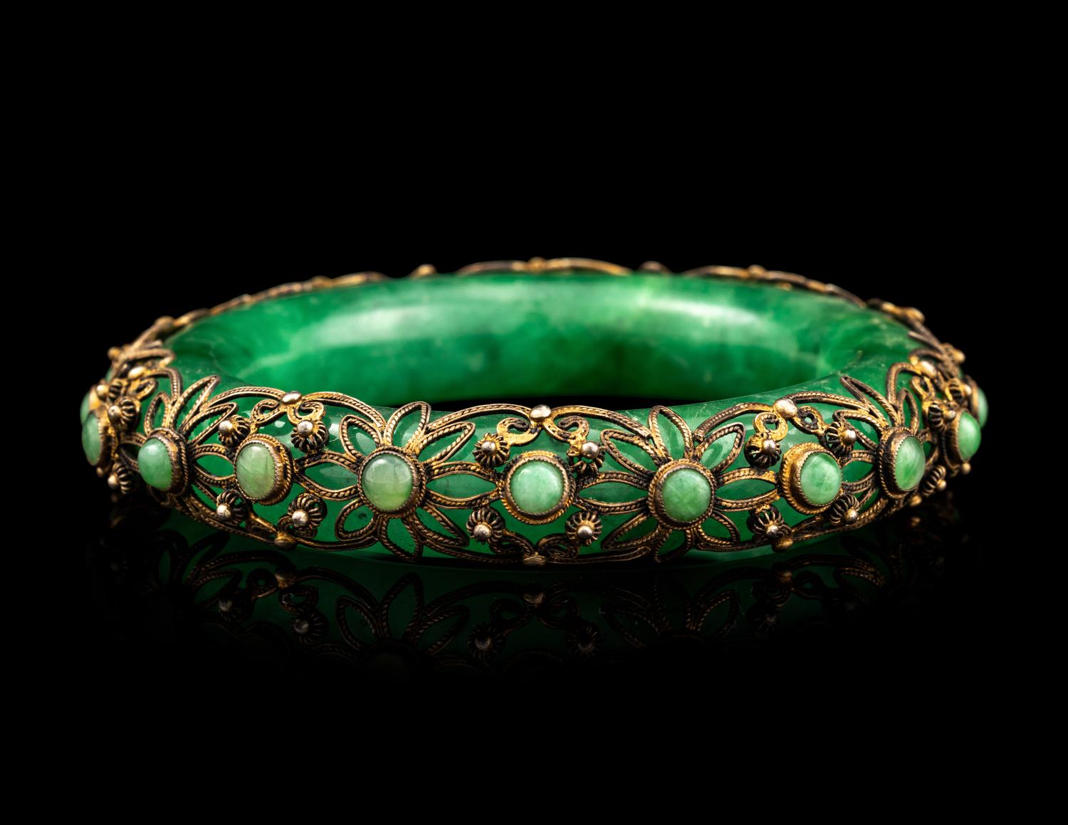 A Chinese Silver Mounted Jadeite Bangle