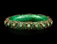 A Chinese Silver Mounted Jadeite Bangle