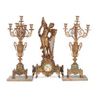 A Neoclassical Gilt Metal and Onyx Clock Garniture