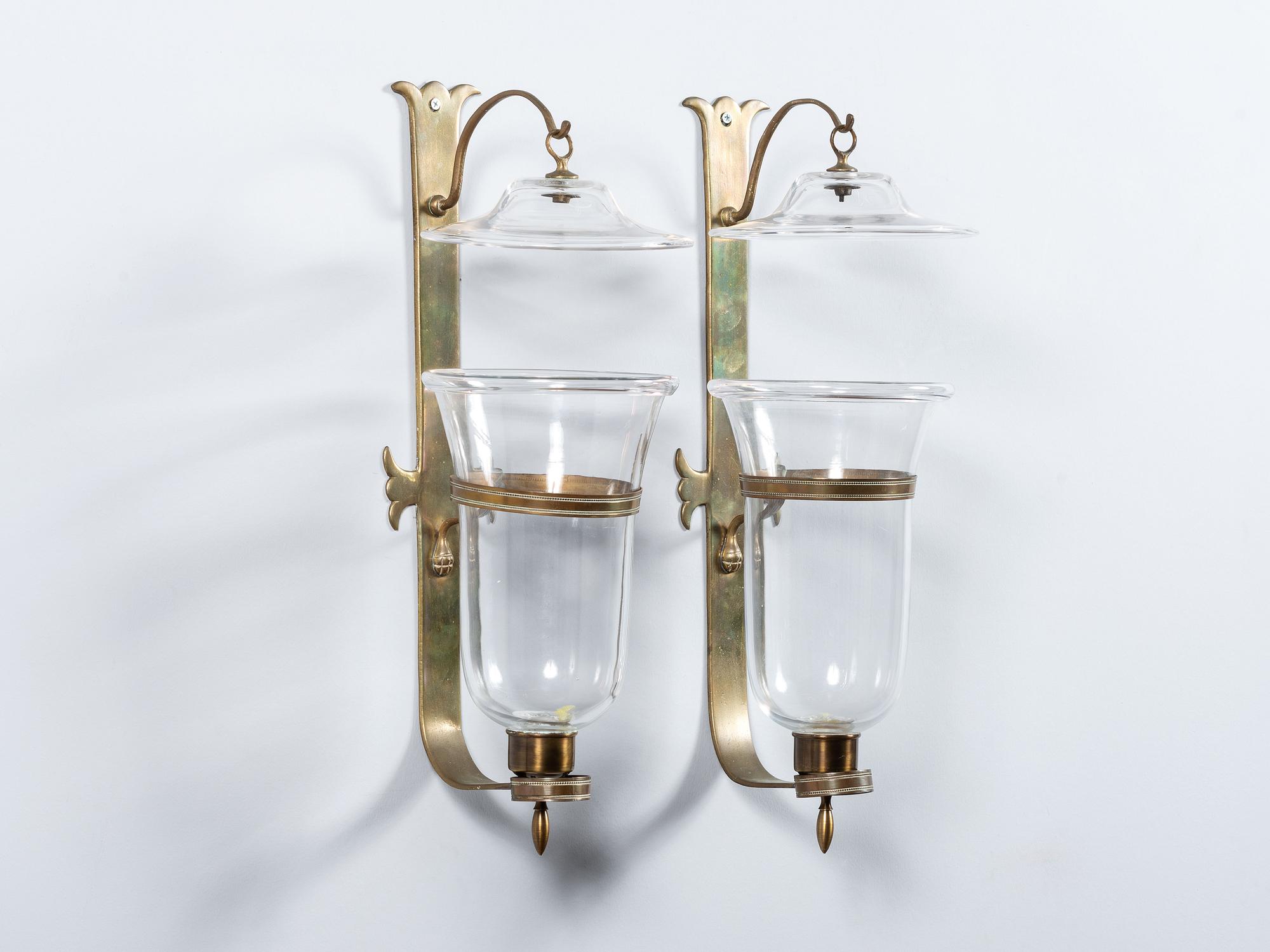 A Pair of Brass and Glass Hurricane Wall Sconces