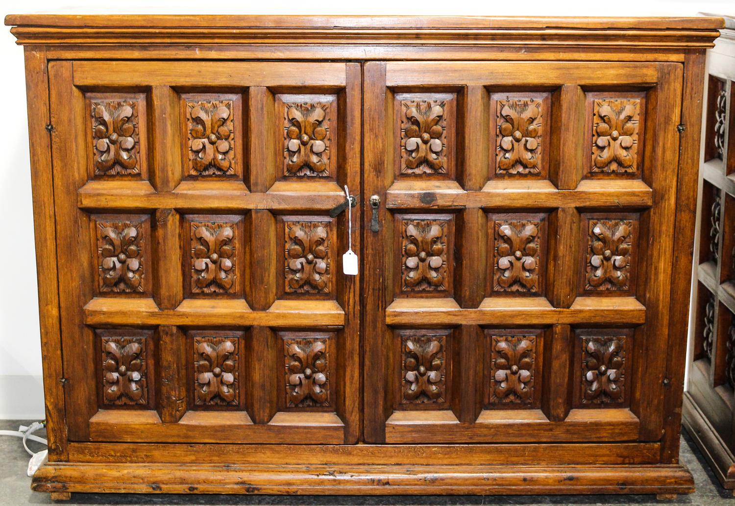 A Mexican Pine Cabinet Height 36 x width 49 x depth 16 1/2 inches.