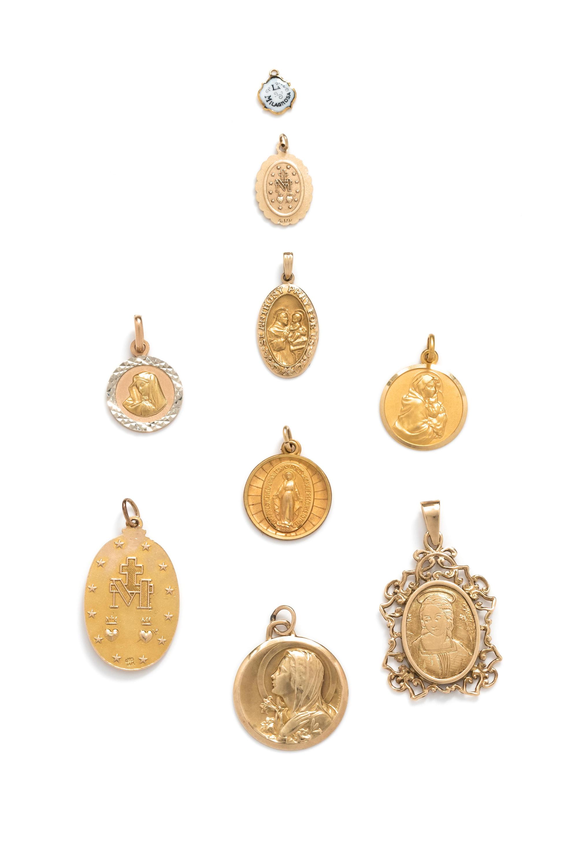 COLLECTION OF YELLOW GOLD RELIGIOUS PENDANTS