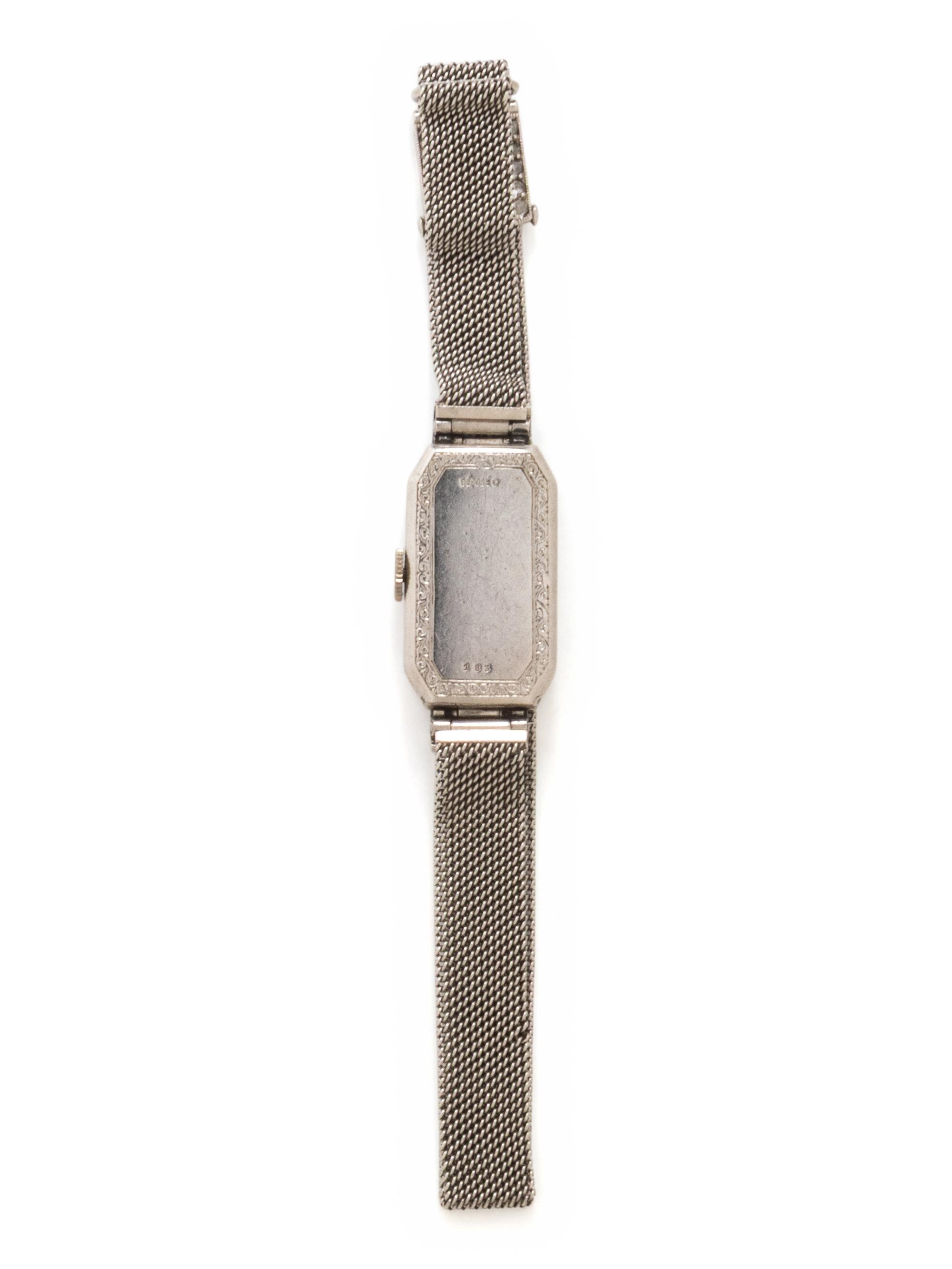 GÜBELIN, PLATINUM, DIAMOND, SYNTHETIC SAPPHIRE AND BLACK ONYX WATCH