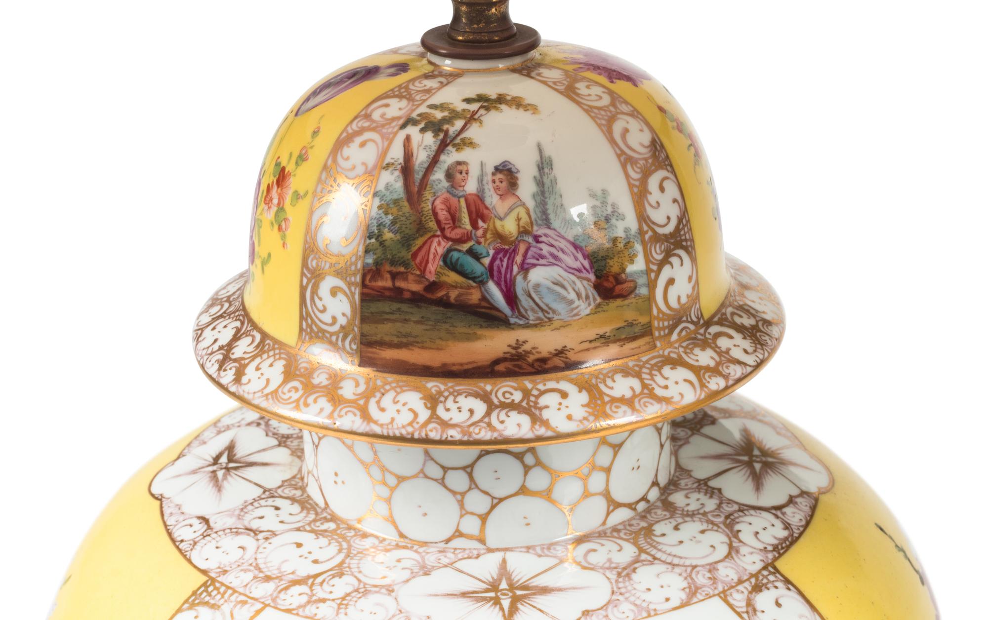 A Pair of German Porcelain Urns Mounted as Lamps