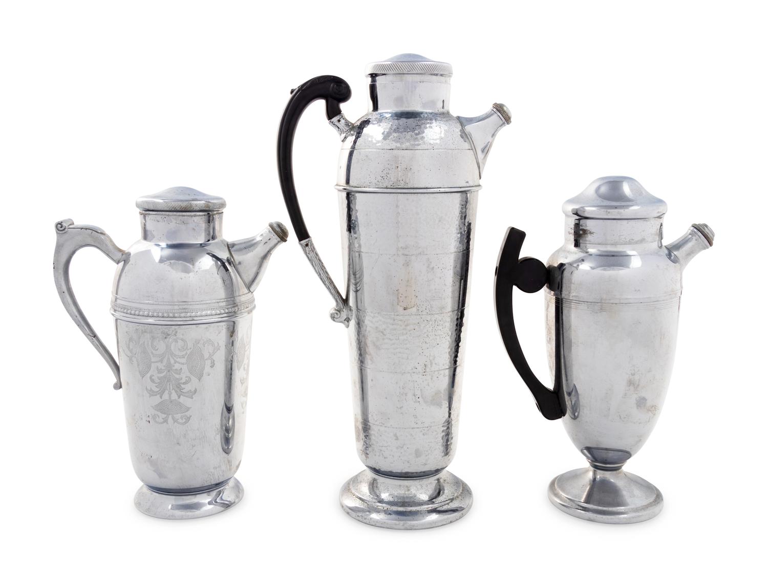 A Group of Three Cocktail Shakers