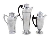 A Group of Three Cocktail Shakers
