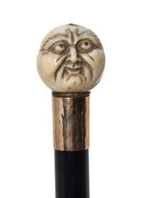 A Japanese Ivory Handled Walking Stick, Diameter of handle 1 1/2 x length overall 36 3/8 inches.