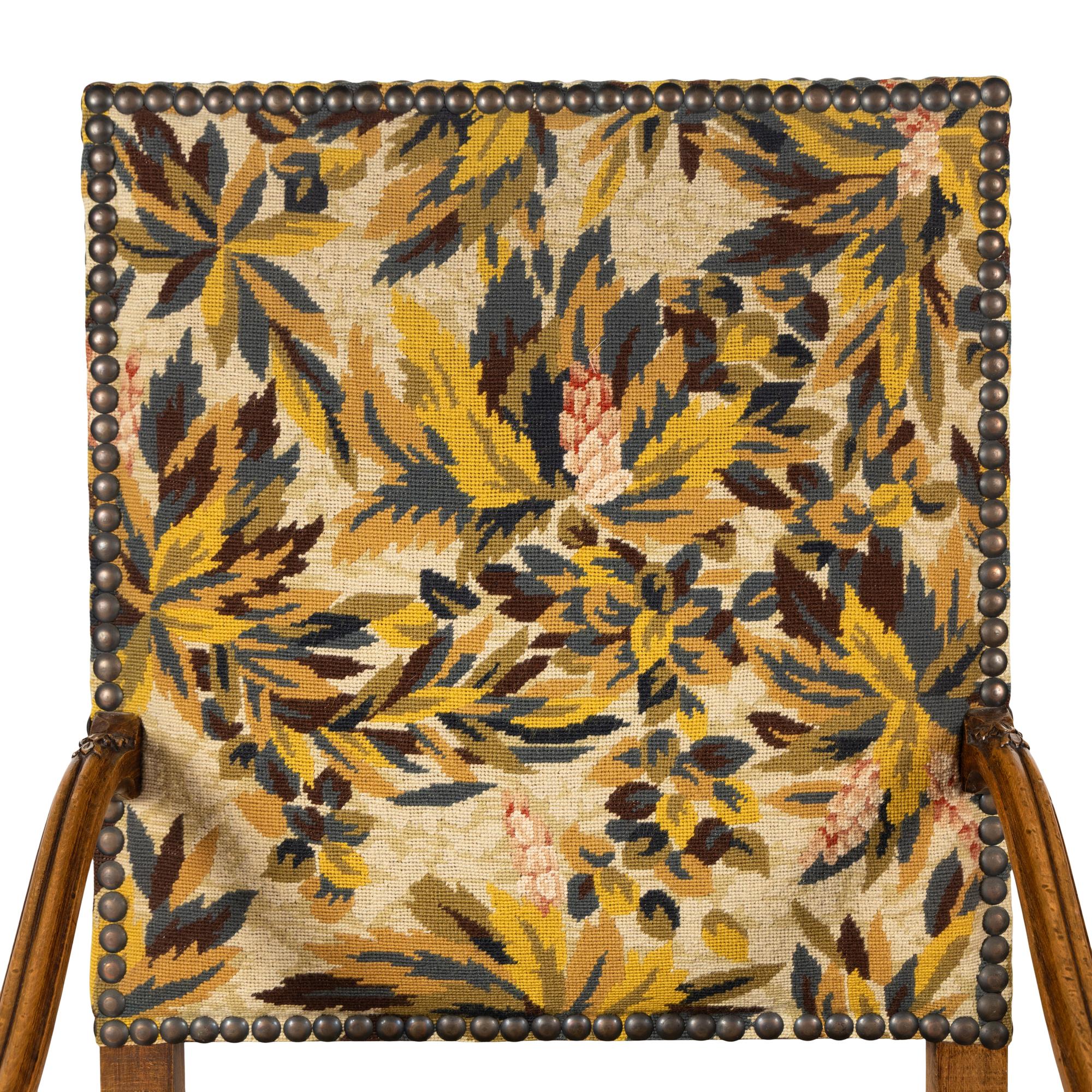 A Pair of French Baroque Style Walnut Armchairs