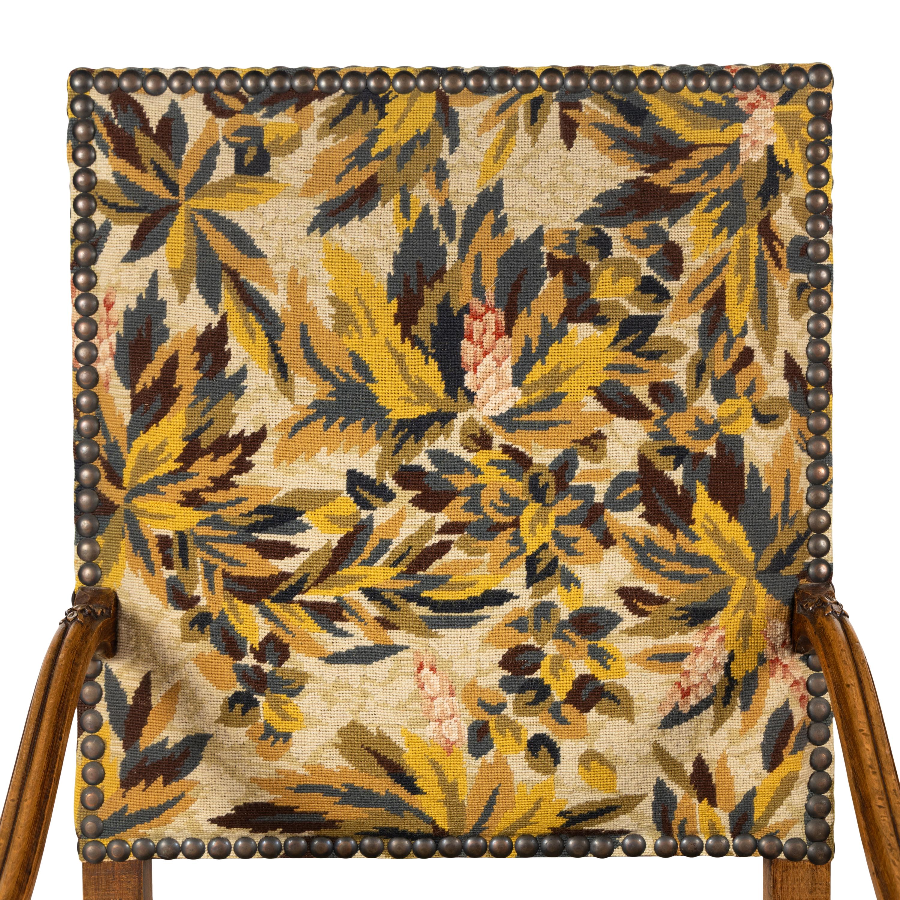 A Pair of French Baroque Style Walnut Armchairs