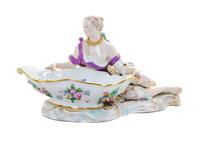 A Meissen Porcelain Figural Salt Width 12 1/2 inches.