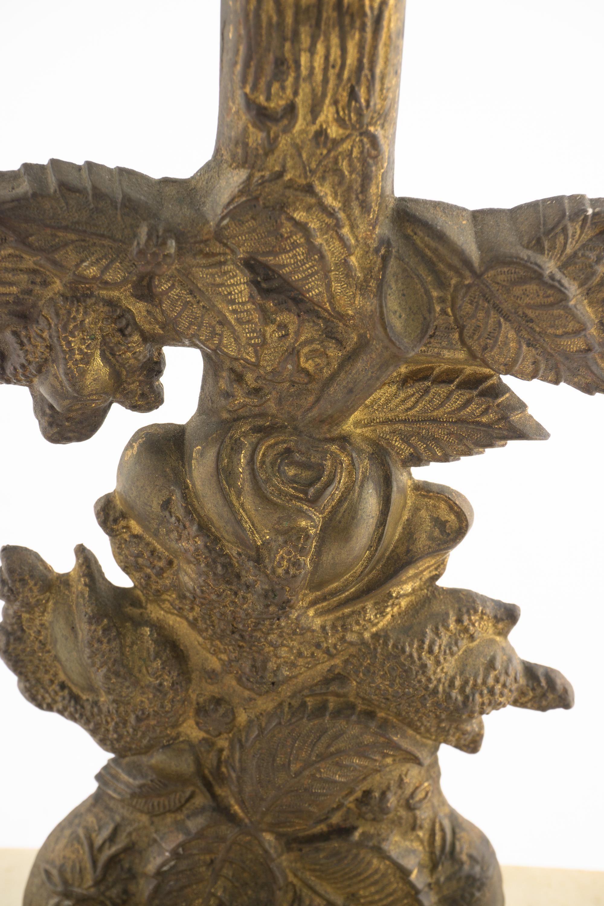 A Pair of Gilt Metal Candlesticks