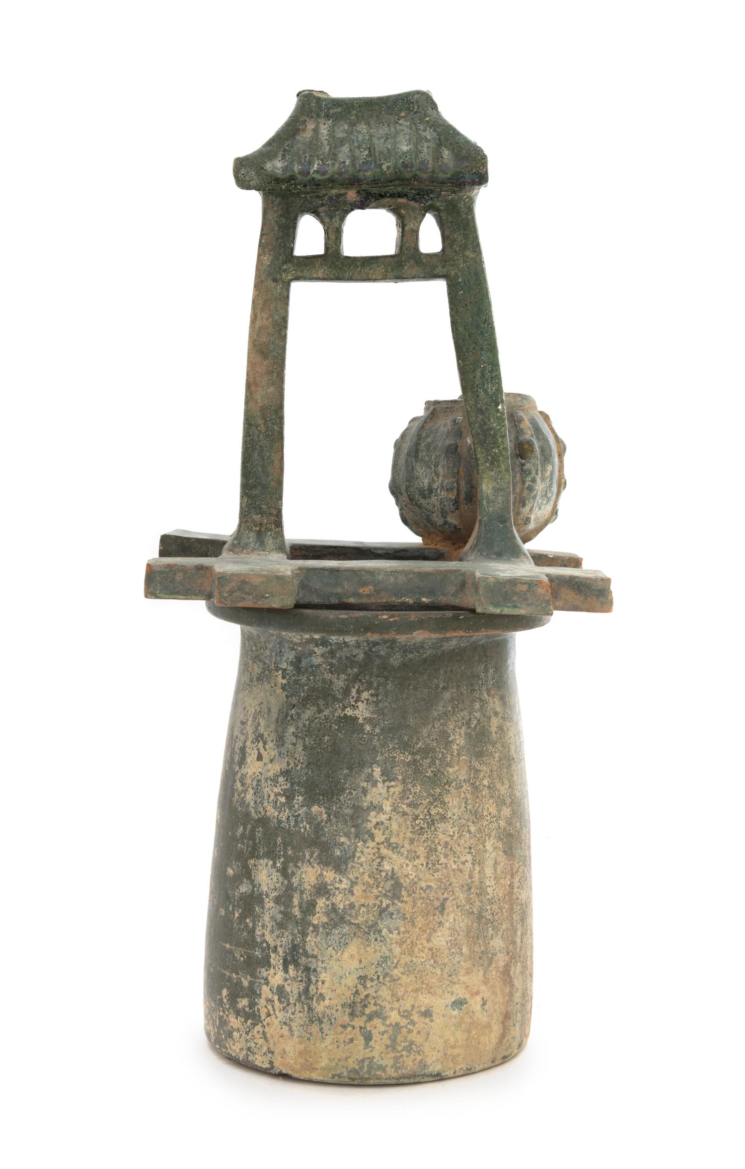 A Chinese Green Glazed Pottery Model of a Well Height 14 1/2 inches. — HAN DYNASTY (206 B.C. - A.D. 220)