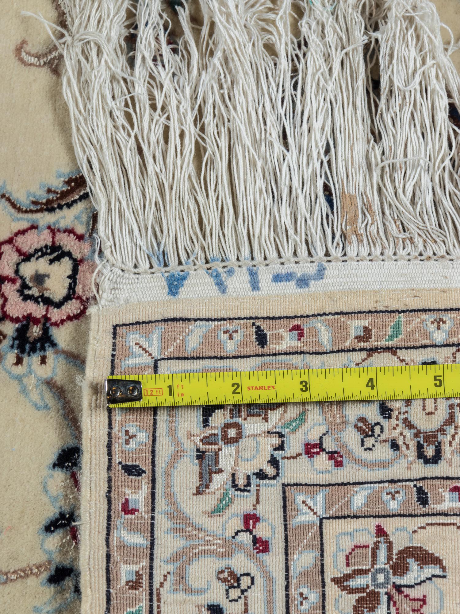 A Nain Silk and Wool Blend Rug
