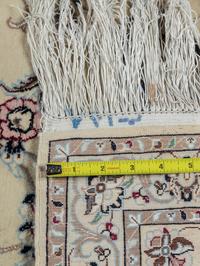 A Nain Silk and Wool Blend Rug