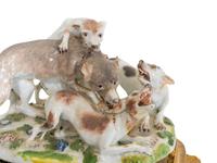 A German Porcelain Hunting Dog and Wolf Group on a Gilt Bronze Stand