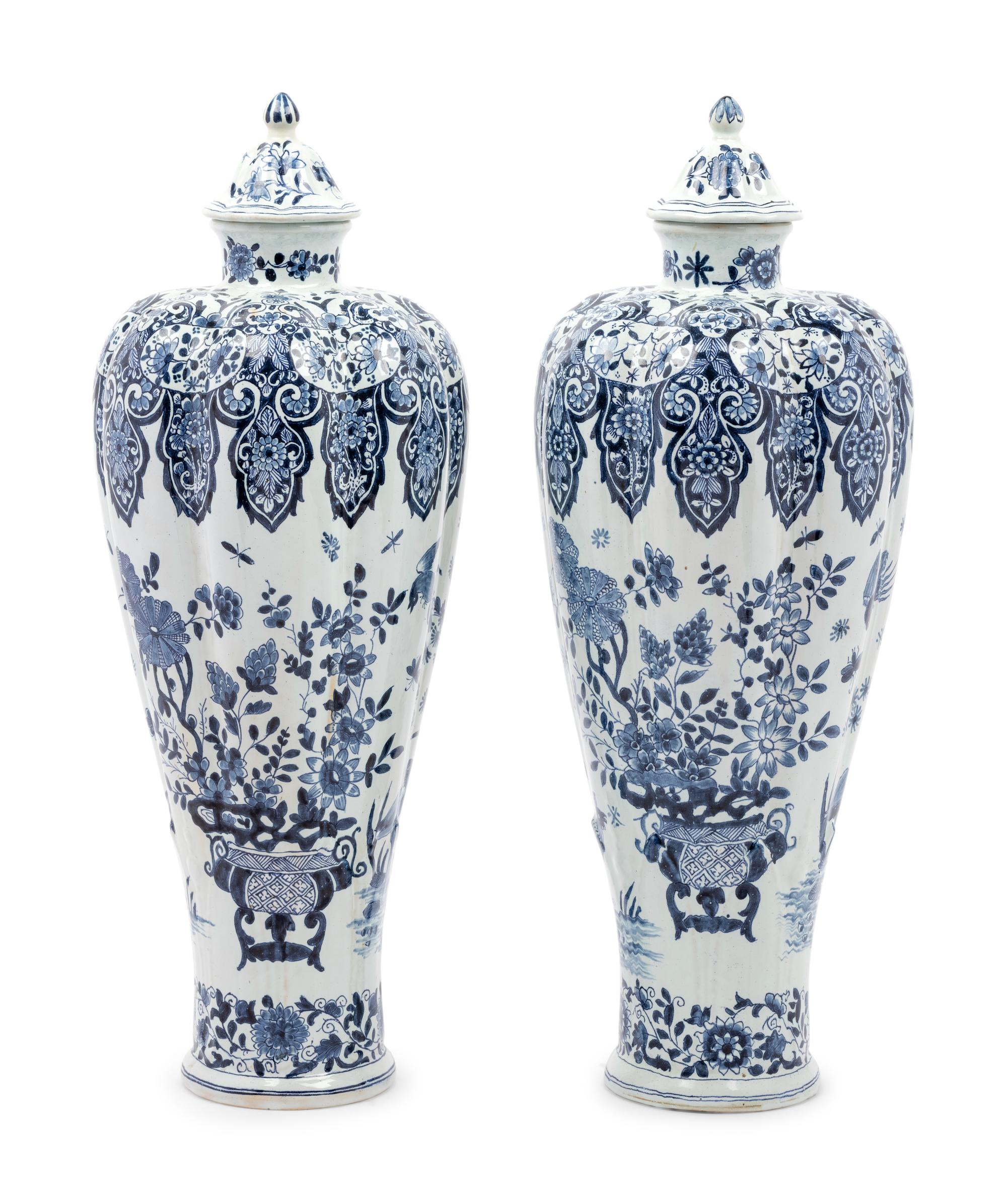 A Pair of Delft Covered Vases