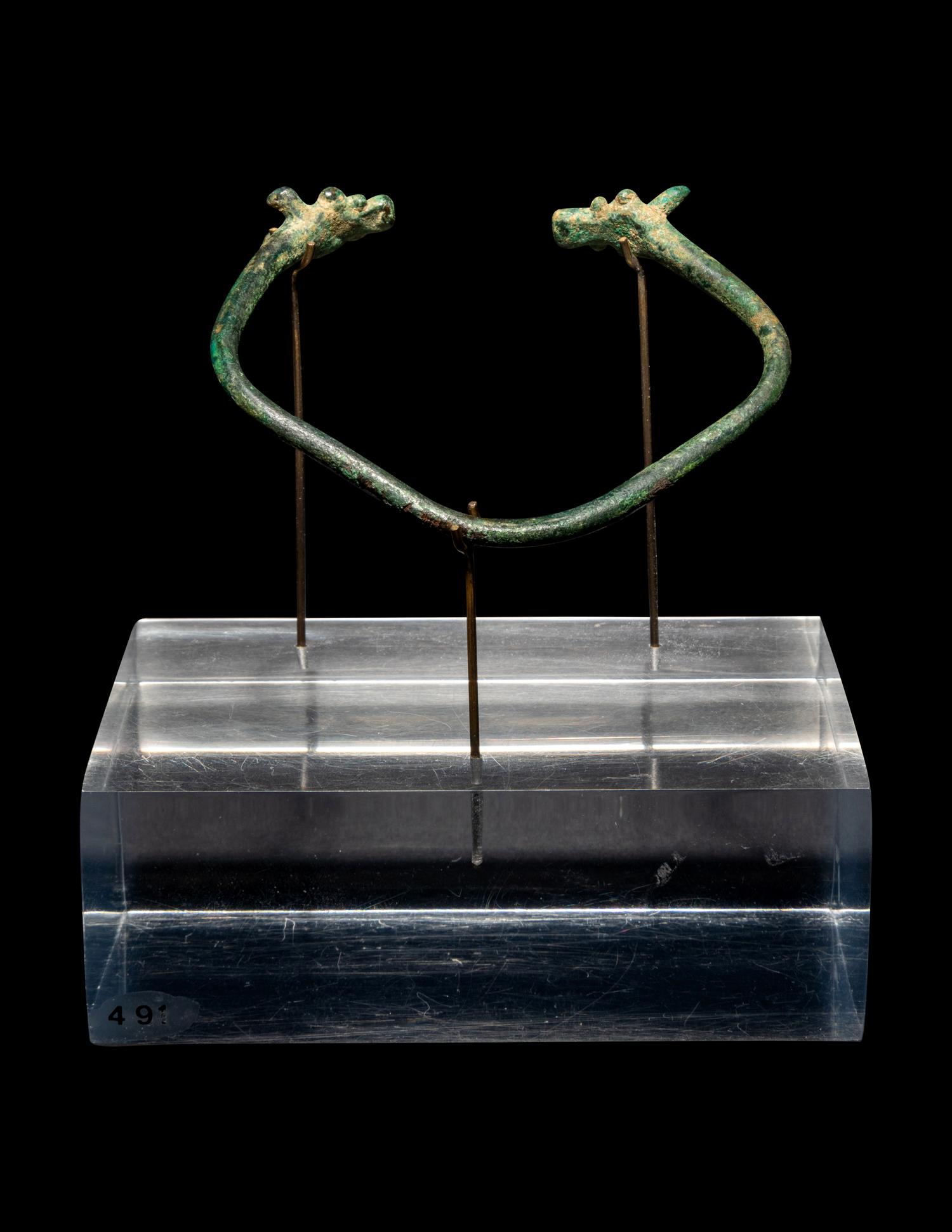 An Amlash or Luristan Bronze Bracelet with Animal Finials