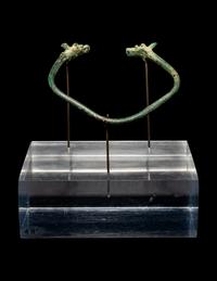 An Amlash or Luristan Bronze Bracelet with Animal Finials