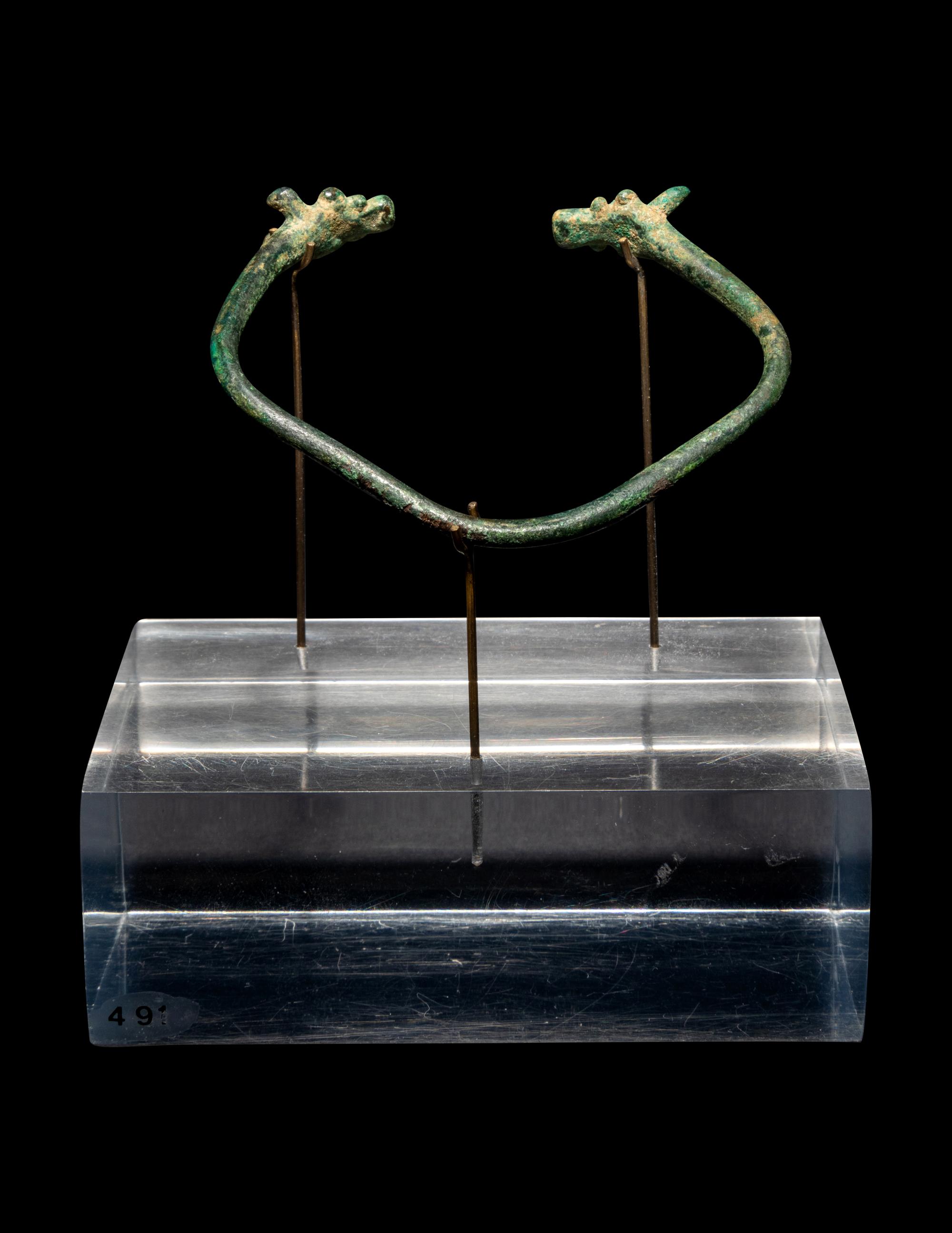 An Amlash or Luristan Bronze Bracelet with Animal Finials
