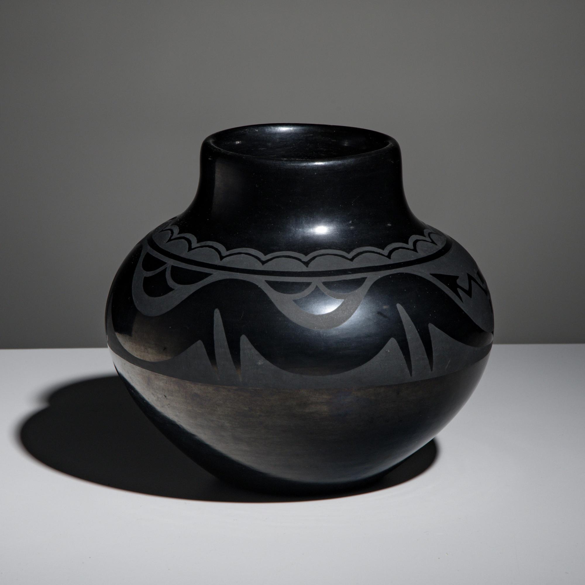 Maria Martinez and Popovi Da (San Ildefonso, 1887-1980 / 1923-1971) — Blackware Pottery Jar, with Avanyu April 1962
