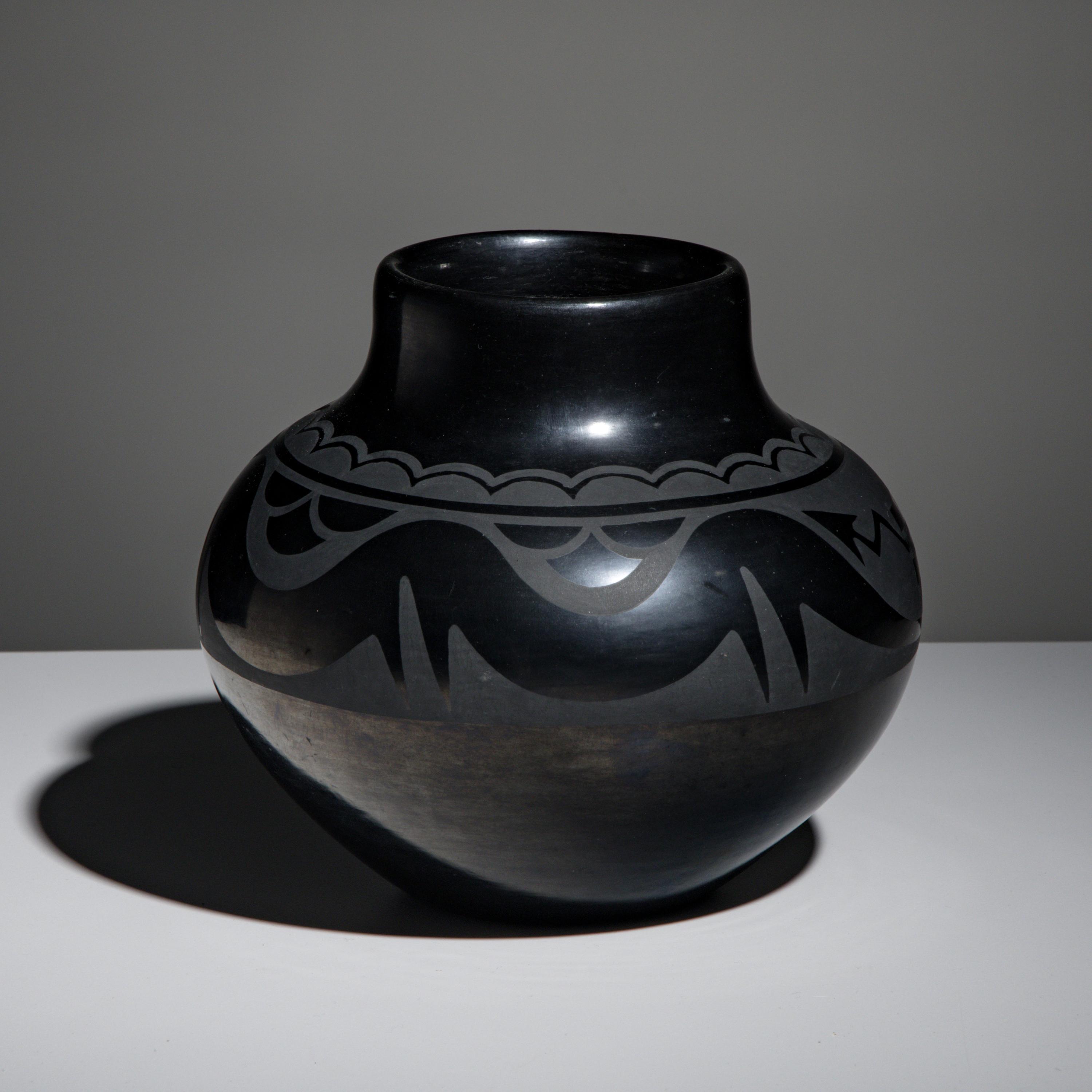 Maria Martinez and Popovi Da (San Ildefonso, 1887-1980 / 1923-1971) — Blackware Pottery Jar, with Avanyu April 1962