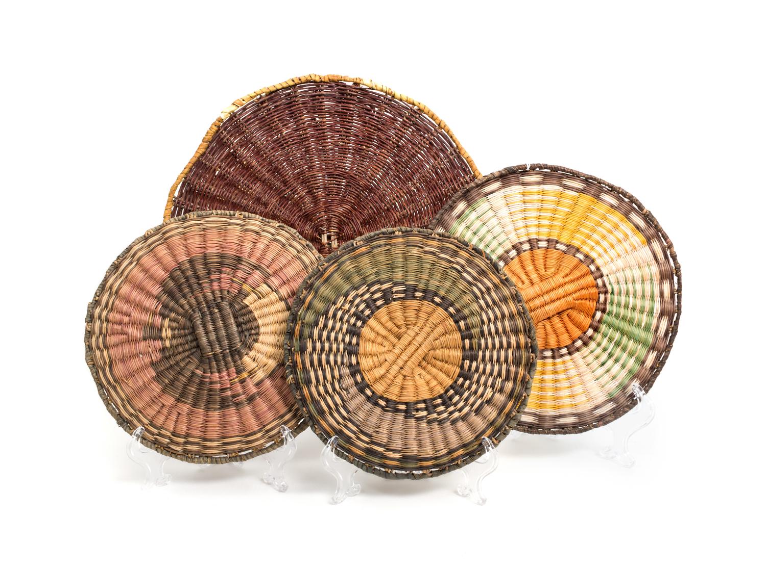 Eight Hopi Basket Trays Diameter 14 1/4 inches.