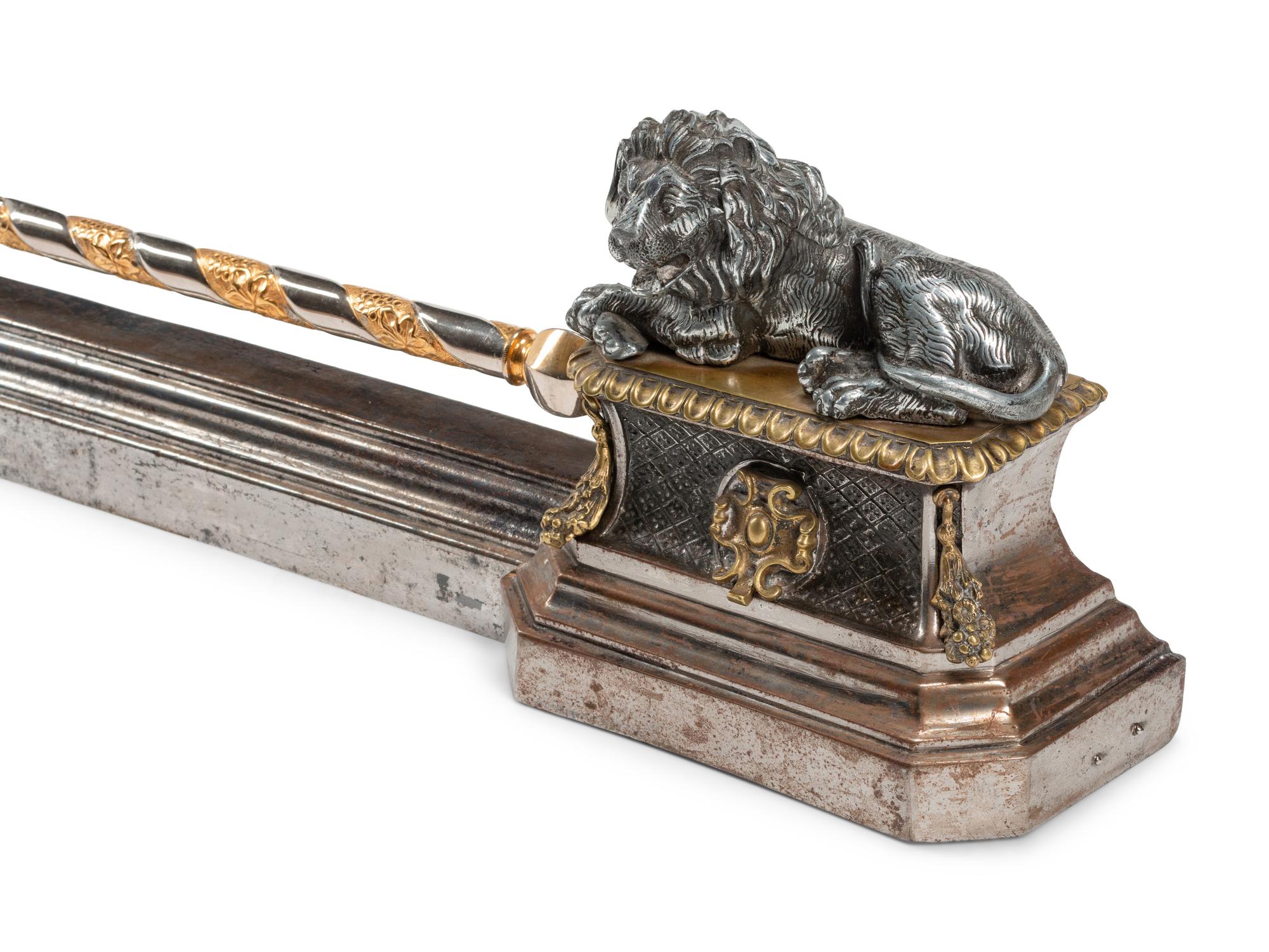 A Continental Steel and Gilt Bronze Fire Fender